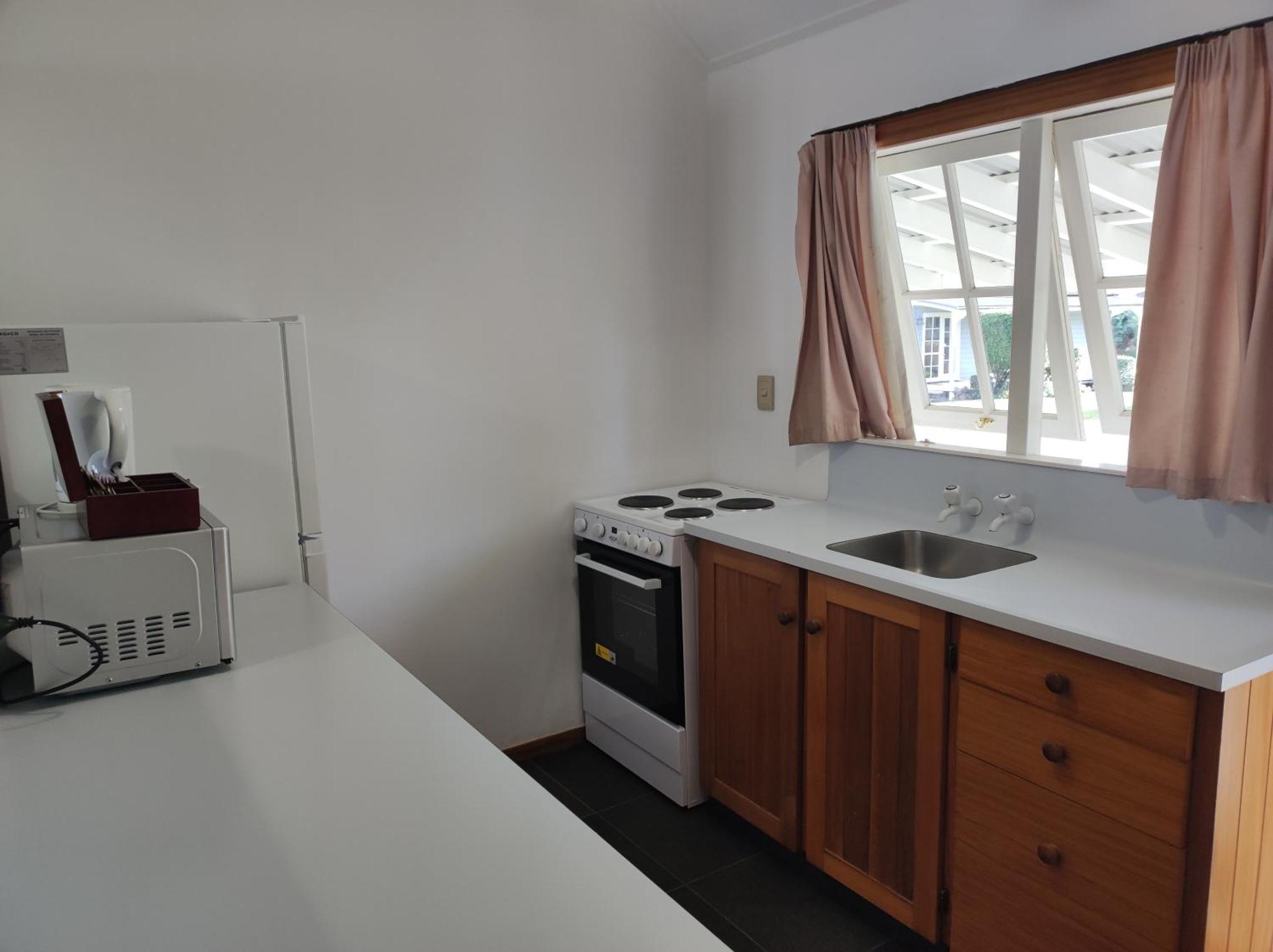 Huka Falls Resort Τούπο Εξωτερικό φωτογραφία A kitchen in a student flat